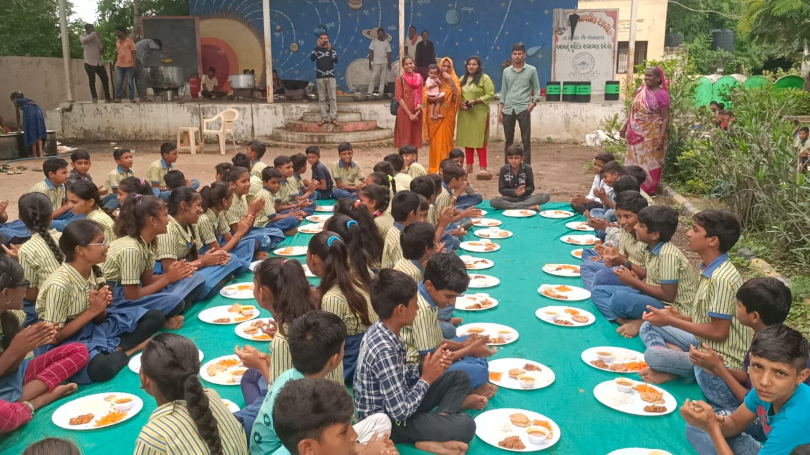 Celebrating daughter's birthday by giving Tithi meal to school children.