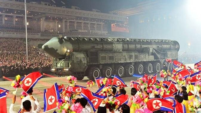 North Korea showed off its might in a military parade, with missile-attacking drones