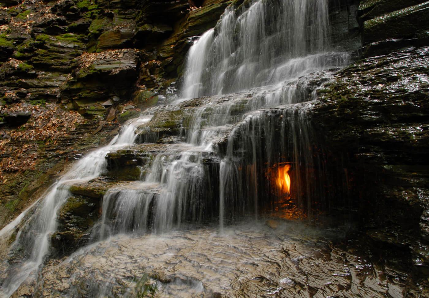 The most unique waterfall in the world, under which fire always burns