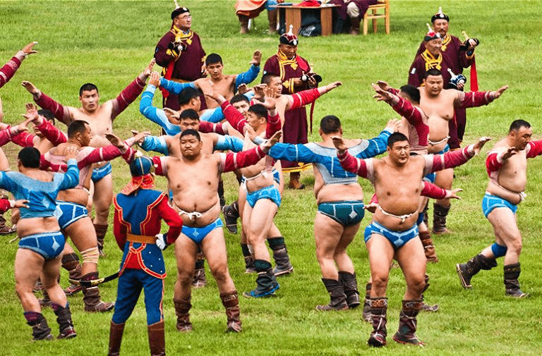 In this festival people wrestle in lines, wear such unique dresses