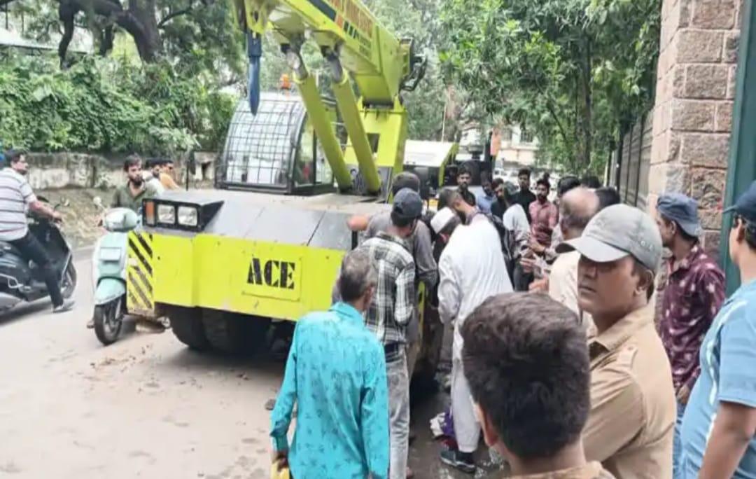 In Surat, the giant tires of a crane rolled off the feet of a father and son