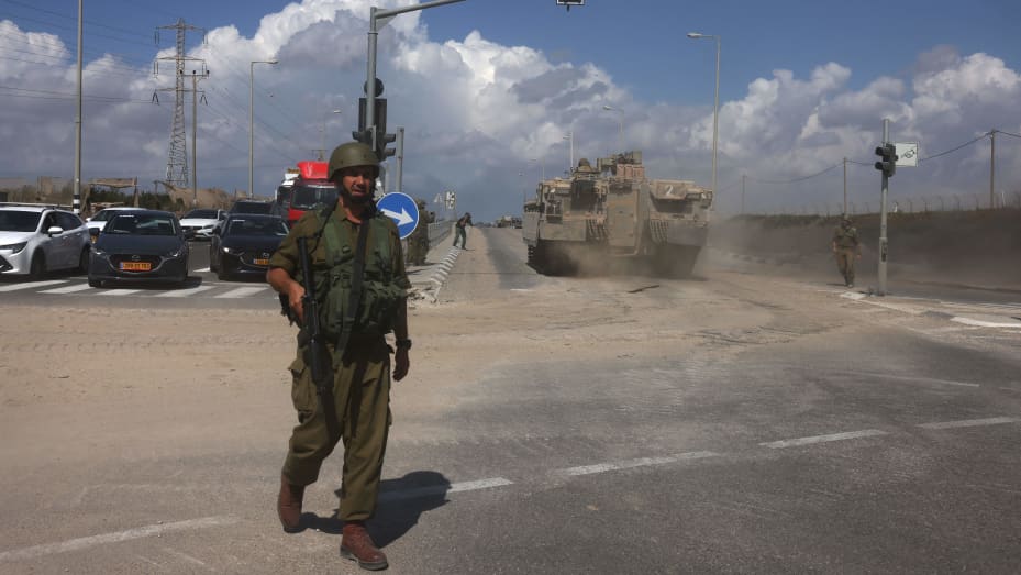 Israel ready to break the back of Hamas, Israeli defense minister arrives at Gaza border, meets soldiers