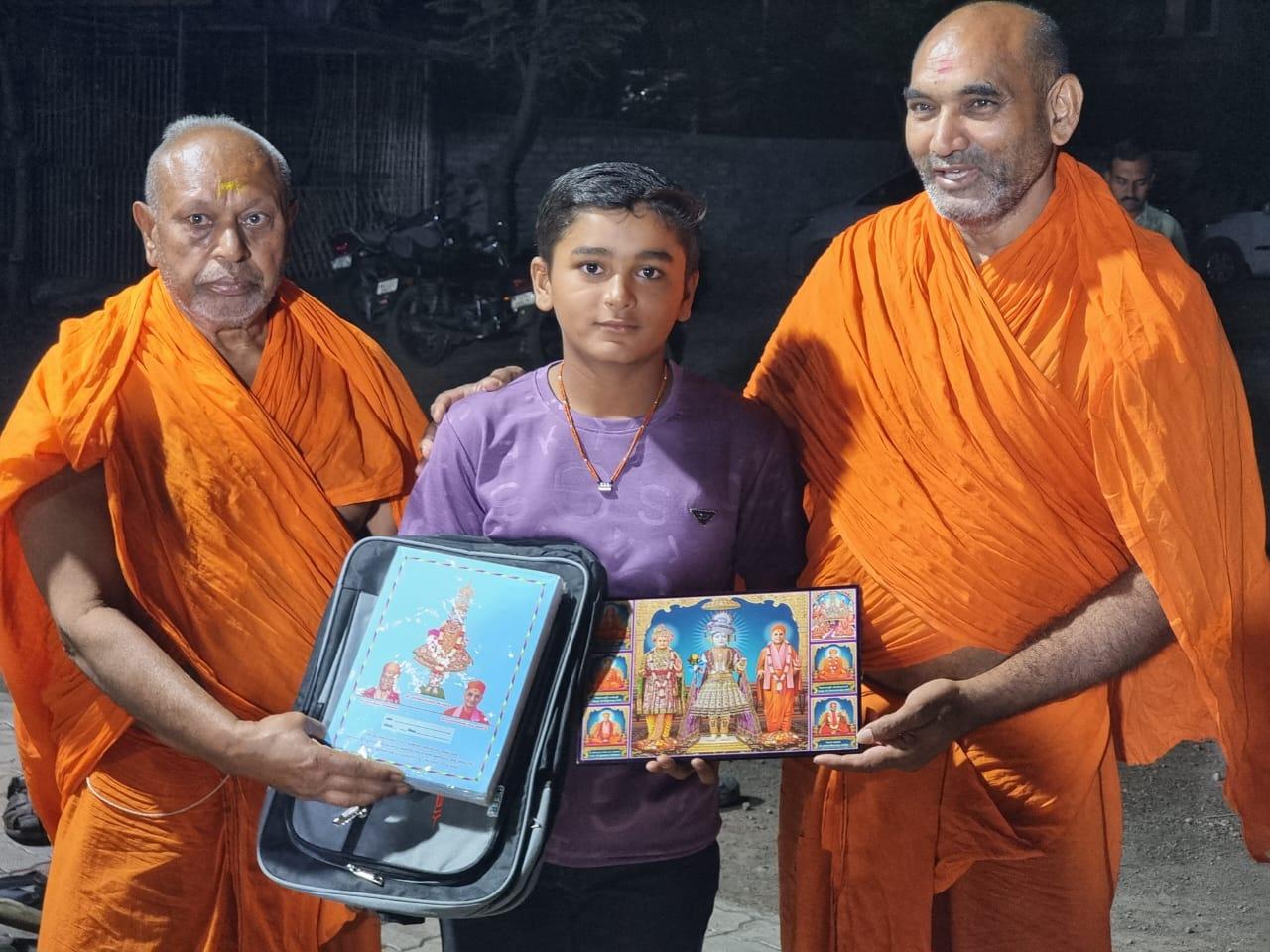 Venerable saints of Sri Swaminarayan Gadi Sansthan, Maninagar honor Botad player Kavya Patel who scored a triple century in Under-14 cricket tournament...