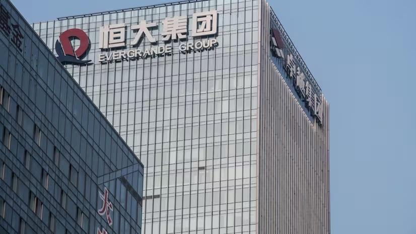 Hong Kong court orders China Evergrande closed, charges $300 billion