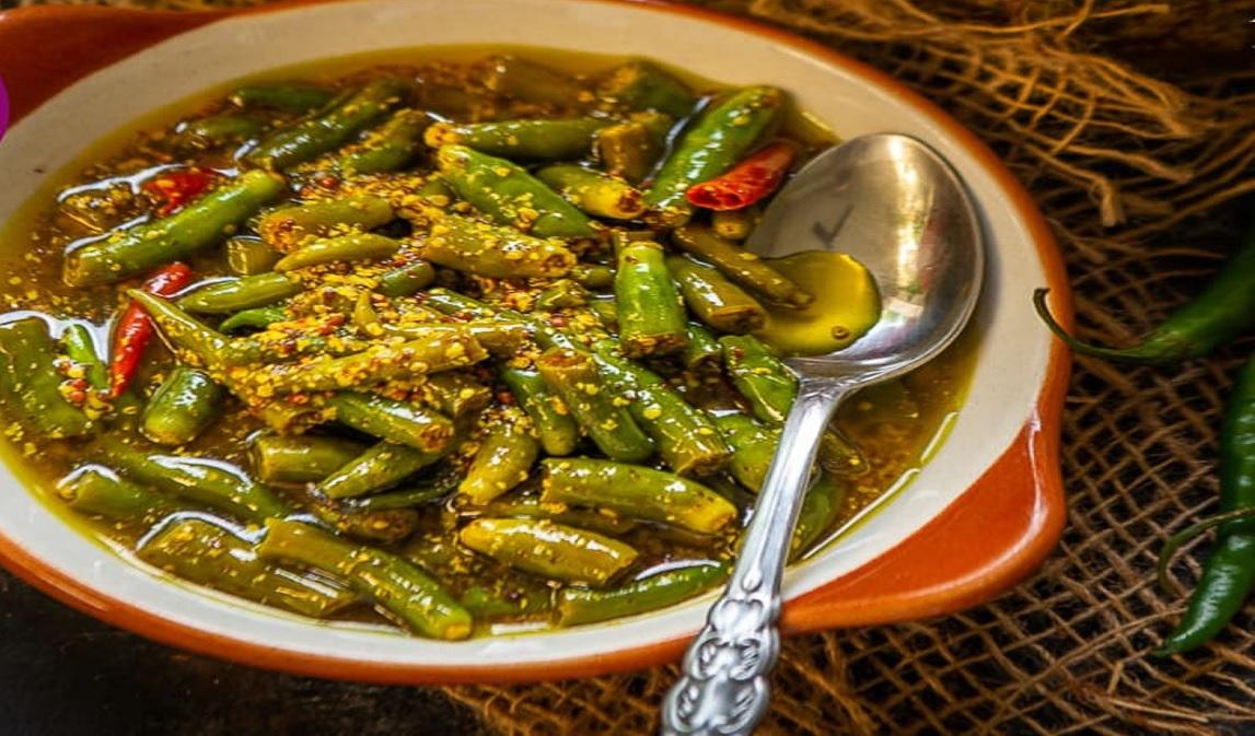 Prepare this green chili pickle right away to get a better taste of the food