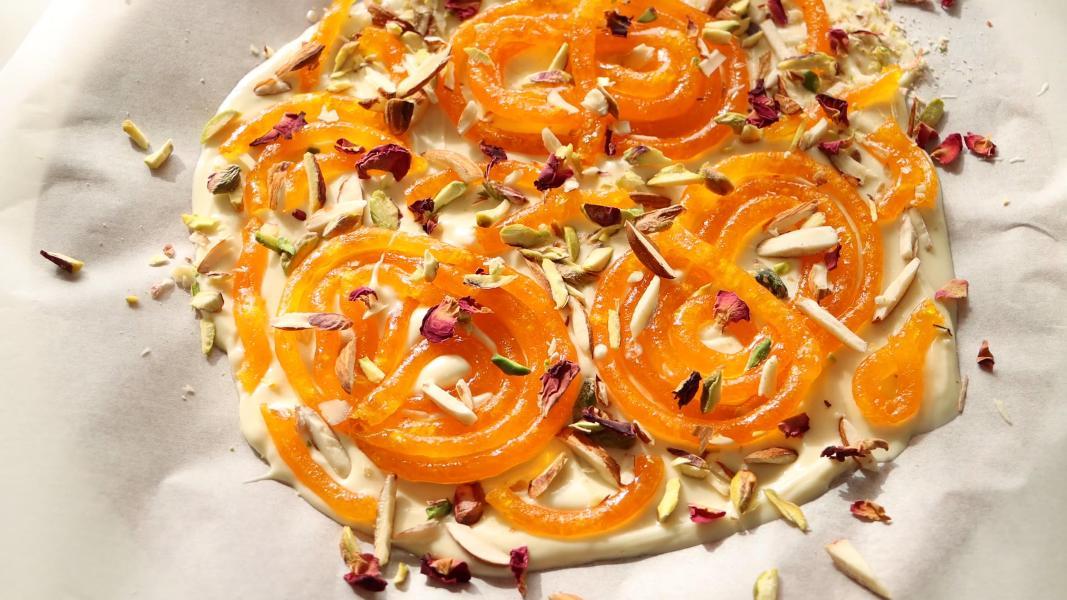 Give a new twist to the taste of Jalebi this Taherwar, try this White Chocolate Bark Jalebi recipe